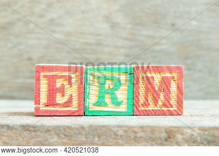 Color Alphabet Letter Block In Word Erm (abbreviation Of Enterprise Risk Management) On Wood Backgro