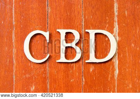 Alphabet Letter In Word Cbd (abbreviation Of Central Business District Or 
Cannabidiol) On Old Red C