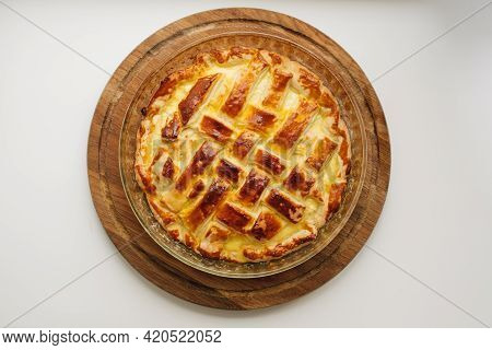 Homemede Apple Cake On A Wooden Desk
