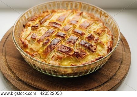 Homemede Apple Cake On A Wooden Desk