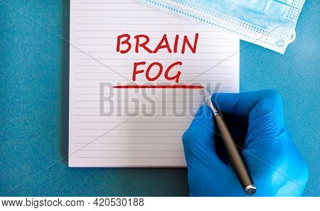 Medical, Covid-19 Pandemic Coronavirus Brain Fog Symbol. Doctor Hand. White Note With Words 'brain F
