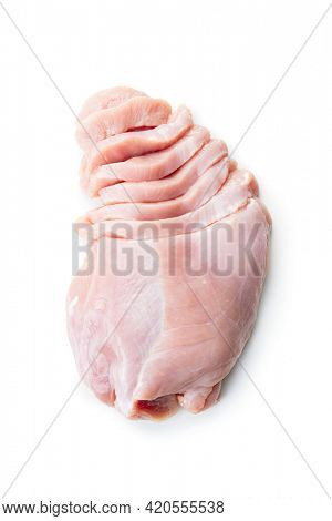 Poultry meat. Sliced raw turkey meat. Breast meat isolated on white background.