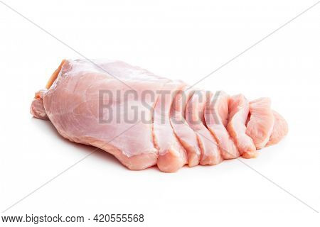 Poultry meat. Sliced raw turkey meat. Breast meat isolated on white background.