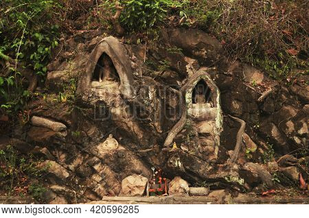 Small Buddha Statue And Holy In Wall Of Wat Phou Si Stupa Temple Of Luangprabang Lao City For Laotia