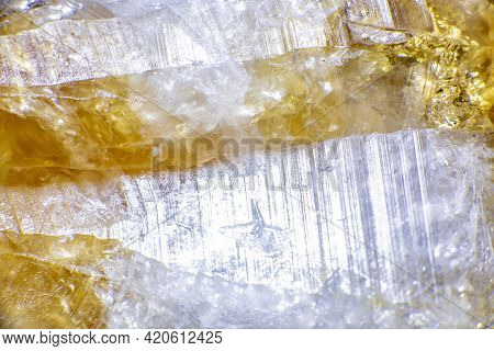 Macro Shooting Of Natural Rock Specimen. Raw Crystal Of Citrine Yellow Quartz Gemstone From Brazil. 