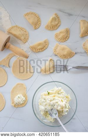 Pierogi Ruskie, Baked Dumplings Stuffed With Curd Cheese And Potatoes