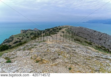 The Trail To The Sea Along The Top Of Cape Alchak. Sudak, Crimea. Cloudy Day At The End Of April.