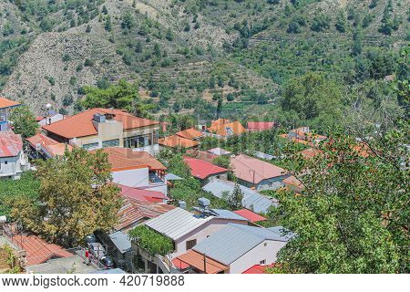 Roofs Of Kykkos Monastery Between Green Trees On A Clear Sunny Day