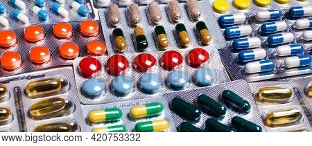 Blisters With Multi-colored Tablets, Antibiotics, Viamines Next To Each Other. Pharmaceuticals. Medi