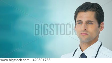 Caucasian male doctor against blue and white gradient background. healthcare and medical research technology concept