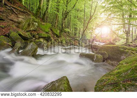 Mountain Stream In The Woods Of Stone On A Long Exposure In The Sun. Beautiful Nature.