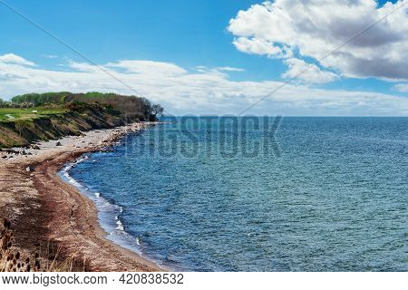 Coastline And Baltic Sea On German Island Of Fehmarn On Sunny Day In Spring