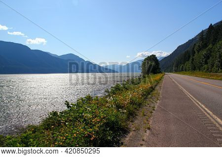 Perfect Day For A Roadtrip: Road In A Beautiful Nature Scenery - Highway Next To Skeena River In The