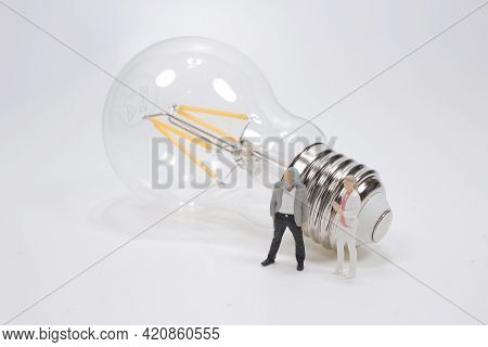 Figure With Light Bulb, Concept Of New Ideas With Inno