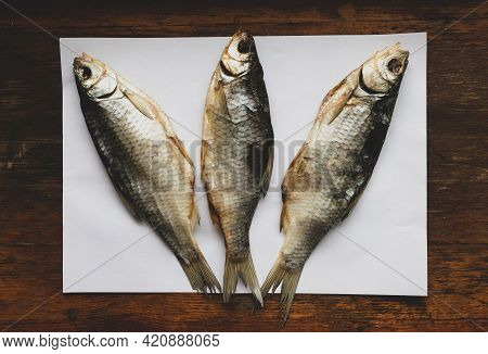 3 Dry Fish In The Process Of Drying On The Windowsill