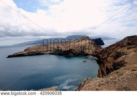 Sea And Rocks Rugged Coast Of Madeira Island.