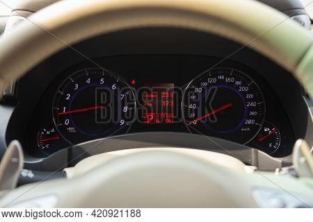 Novosibirsk, Russia - May 16, 2021: Infiniti Qx, New Car Interior Details. Speedometer, Tachometer A