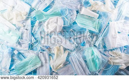 Top View Of Covid-19 Plastic Waste And Garbage, Disposable Masks, Medicl Glove, Alcohol Gel Bottle A