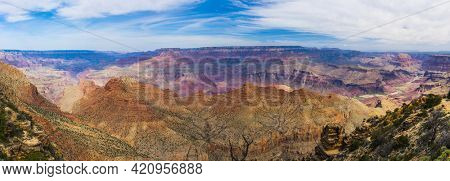 Beautiful colors and shapes of the Grand Canyon shortly after the sunrise at Yavapai Point. Arizona, USA. Panoramic photo