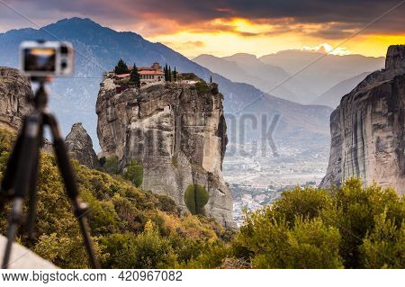 Professional Camera On Tripod Taking Picture Film Video From The Holy Trinity Monastery On Cliff At 
