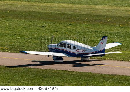 Piper Pa-28-181 Archer Aircraft Is Taxiing At The Airport Saint Gallen Altenrhein In Switzerland 23.