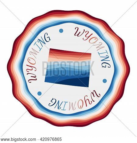 Wyoming Badge. Map Of The Us State With Beautiful Geometric Waves And Vibrant Red Blue Frame. Vivid