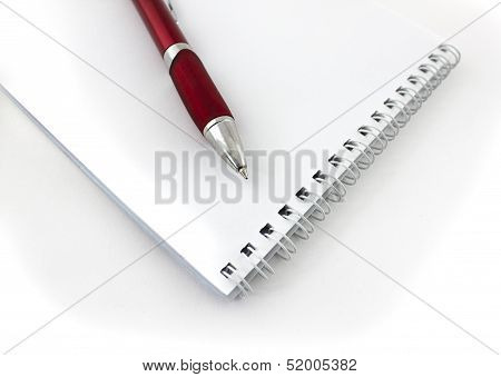 Red Pen And Notepad