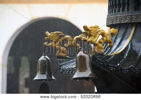 Iron Dragons And Bells In A Chinese Temple