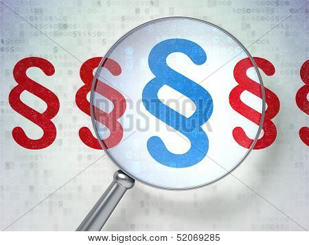 Law concept: Paragraph with optical glass on digital background