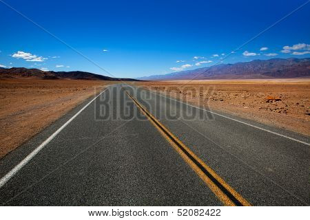 Deserted Route 190 highway in heart of Death Valley California