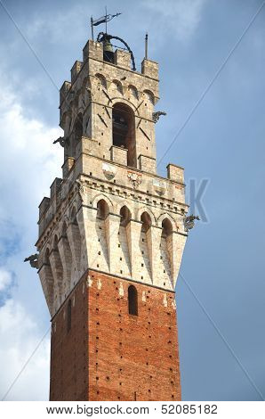 The tower of Palazzo Pubblico on Piazza del Campo in Siena, Tuscany, Italy