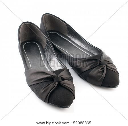 Pair of black casual woman shoes isolated on white background