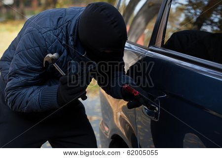 Masked Burglar With Hammer