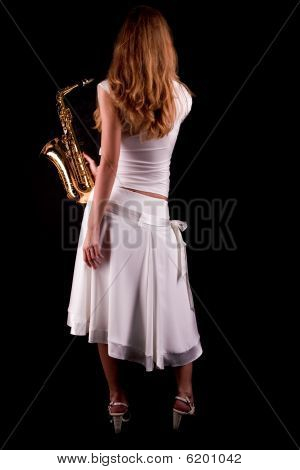 zadní dívka hezká blondýnka hospodářství saxofon