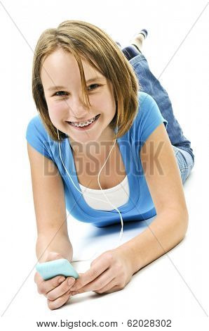 Teenage girl listening to music with her mp3 player