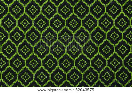 Material in green geometric patterns, a background