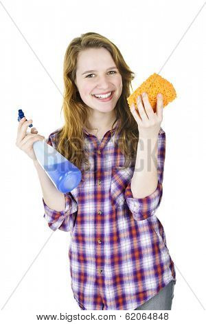 Smiling young woman holding cleaning supplies isolated on white