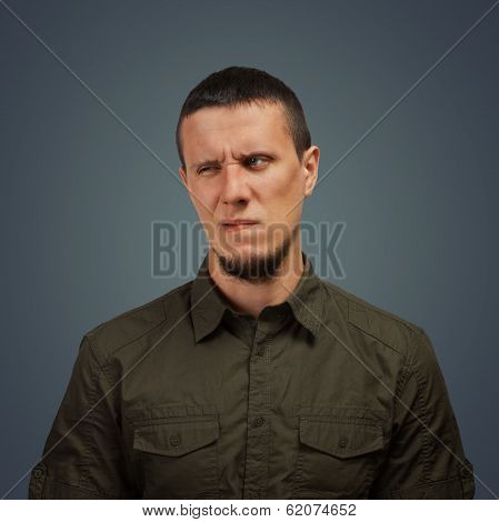 Man With An Expression Of Disgust