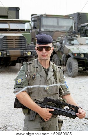 PLOCE, BOSNIA - AUGUST 9: A French mariner stands guard over a supply convoy during the first Anglo-French rapid reaction force deployment in Europe. The force was sent to Bosnia by the UN on August 9, 1995 in Ploce, Bosnia