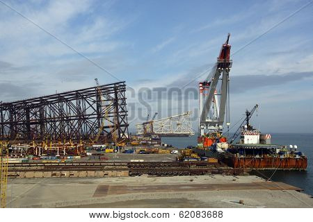 SANGACHAL, AZERBAIJAN  - OCT 29: Roughnecks and engineers build oil platforms in Sangachal, Azerbaijan, on Saturday, October 29, 2006.