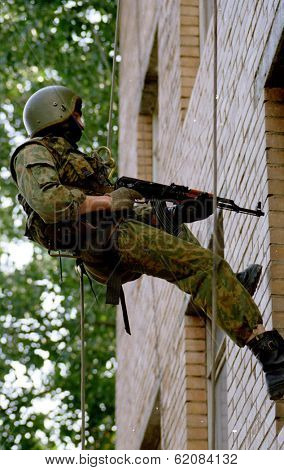 MOSCOW - AUGUST 6:  Russia's elite OMON special police force practice an assault at a training ground in Moscow, Russia, on Sunday,  August 6, 2000.