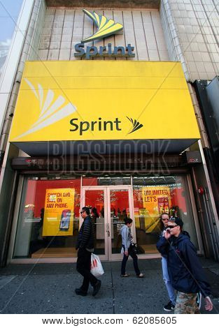 NEW YORK CITY - APRIL 19: People walk past a Sprint mobile telecommunications retail outlet  in New York City, on Friday, April 19, 2013.