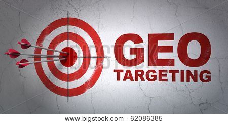 Business concept: target and Geo Targeting on wall background