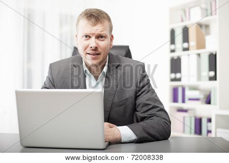 Businessman Listening Intently To The Viewer