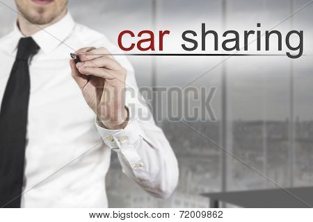 Businessman Writing Car Sharing In The Air