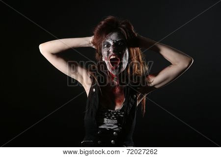 Bleeding Psychotic Woman in a Horror Themed Image