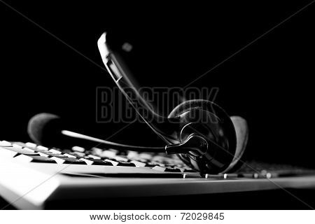 Headset Lying On A Computer Keyboard