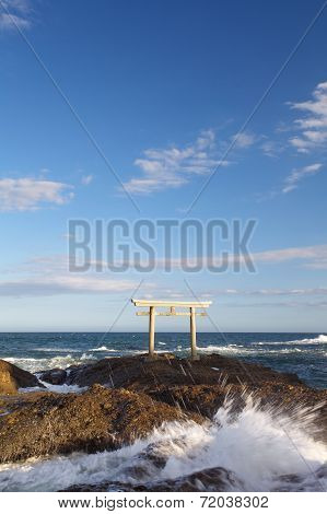 landscape of traditional Japanese gate and sea
