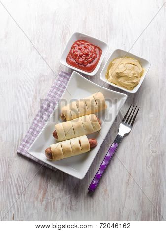 rolled up with wurstel mustard and ketchup