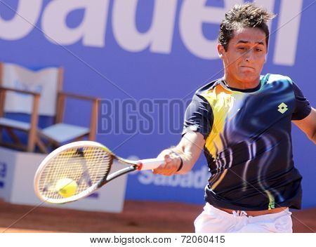 BARCELONA - APRIL, 23: Spanish tennis player Nicolas Almagro in action during a match of Barcelona tennis tournament Conde de Godo on April 23, 2014 in Barcelona